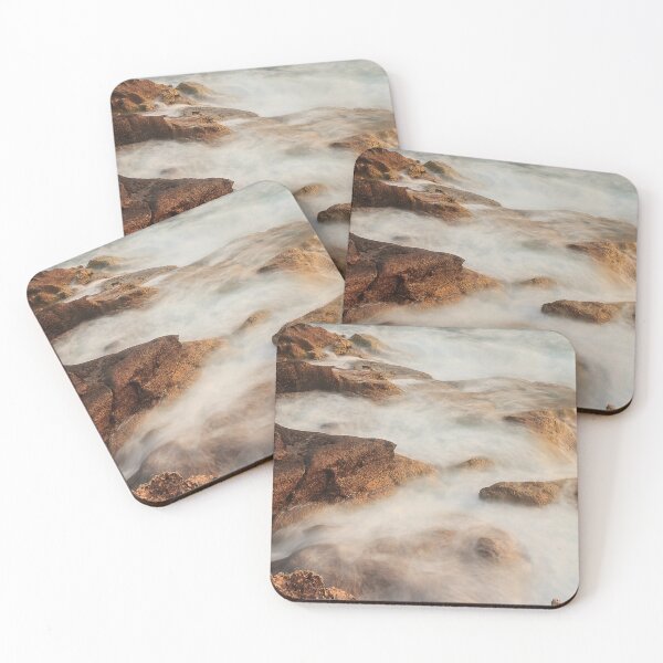 Item preview, Rugged Coastal Rocks Meet Misty Ocean Waves Under Soft Sunset Light Along a Craggy Shore designed and sold by Nmallia.