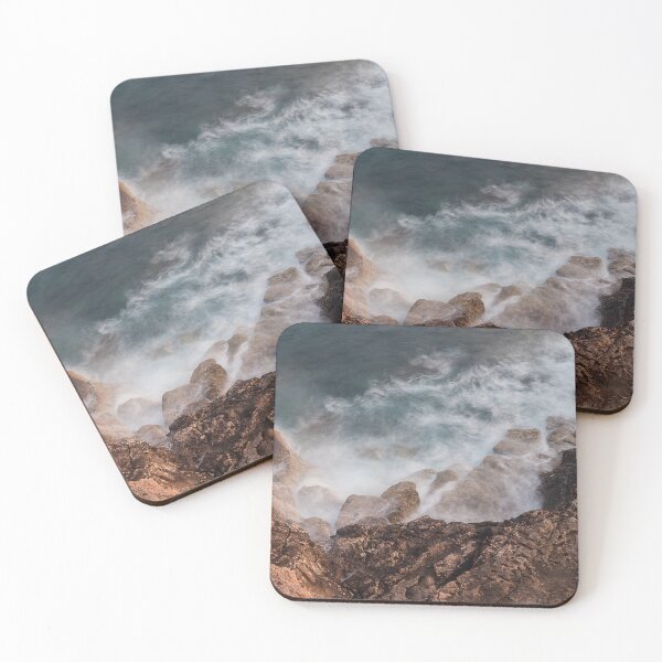 Item preview, Rugged Coastal Rocks Meet Misty Ocean Waves Under Soft Sunset Light Along a Craggy Shore designed and sold by Nmallia.
