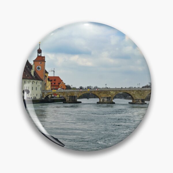 Item preview, German flag and ancient stone bridge over the Danube river in Regensburg, Bavaria, Germany designed and sold by goceris.