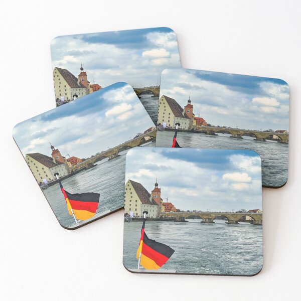 Item preview, German flag and ancient stone bridge over the Danube river in Regensburg, Bavaria, Germany designed and sold by goceris.