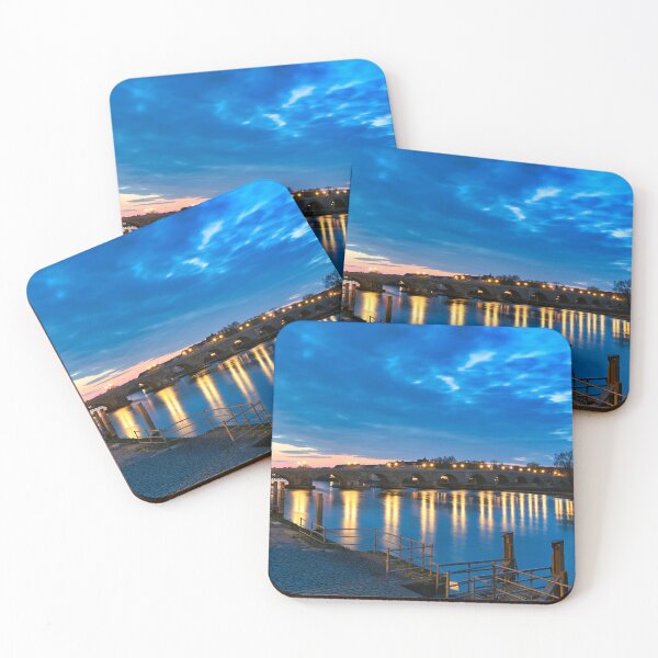 Item preview, Ancient stone bridge over the Danube river at night in Regensburg, Germany designed and sold by goceris.