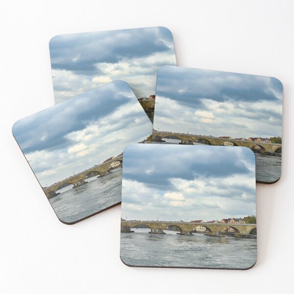 Item preview, Ancient stone bridge over the Danube river and clock tower in Regensburg, Bavaria, Germany designed and sold by goceris.