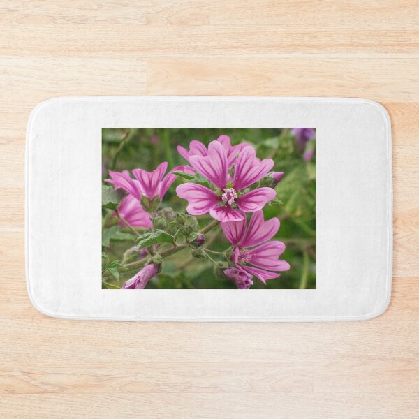 Item preview, Close-Up Of Pink Malva Flowers In A Lush Green Garden Blooming Beauty designed and sold by Nmallia.