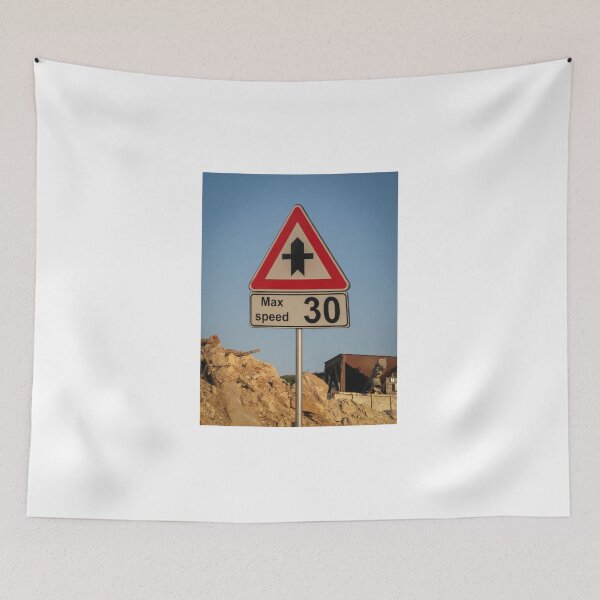 Item preview, Speed Limit 30 Road Sign At Construction Site Under Clear Blue Sky With Rocky Ground designed and sold by Nmallia.