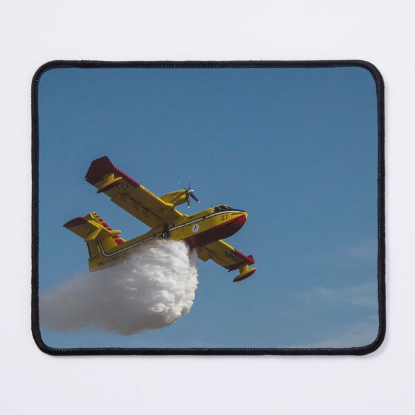 Item preview, Colorful Firefighting Aircraft Dropping Water Over Clear Blue Sky During Aerial Training Exercise designed and sold by Nmallia.