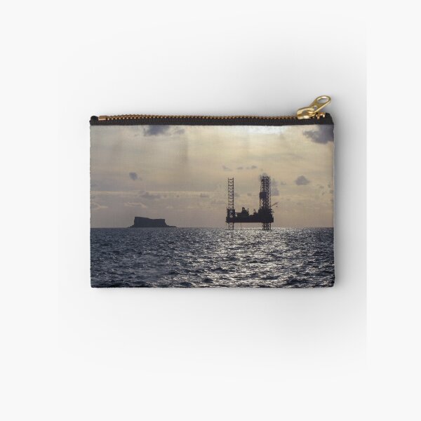 Item preview, Silhouette Of Offshore Oil Rig At Sunset With Small Island On The Horizon designed and sold by Nmallia.