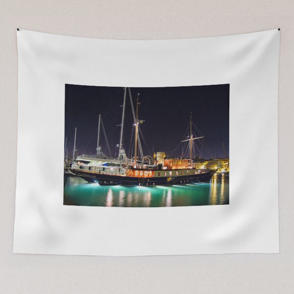 Item preview, Night Yacht in Harbor Bathed in Neon Reflections Amid Glowing City Lights designed and sold by Nmallia.