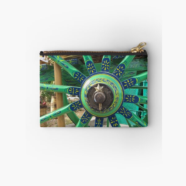 Item preview, Colorful Painted Wagon Wheel With Green, Blue, And Yellow Spokes And Center Detail Vintage Carriage designed and sold by Nmallia.