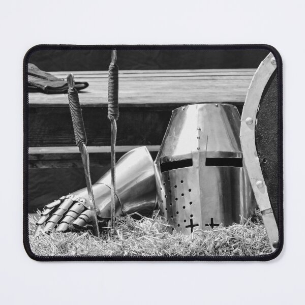 Item preview, Medieval Knight Helmet, Shield, and Gauntlets Resting on Hay with Battered Armor in a Quiet Display designed and sold by Nmallia.