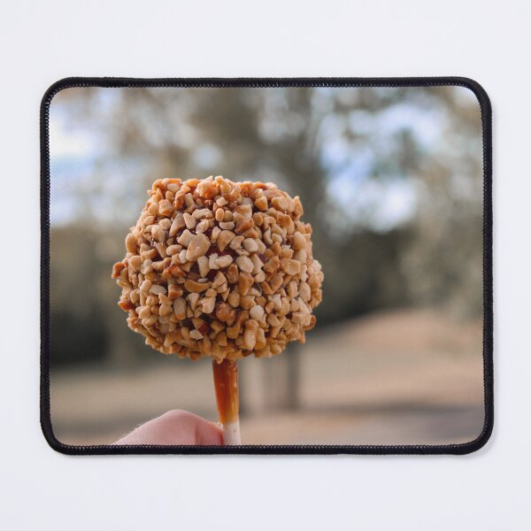 Item preview, Holding a Carmel Apple on a Stick designed and sold by kenedyraemedia.