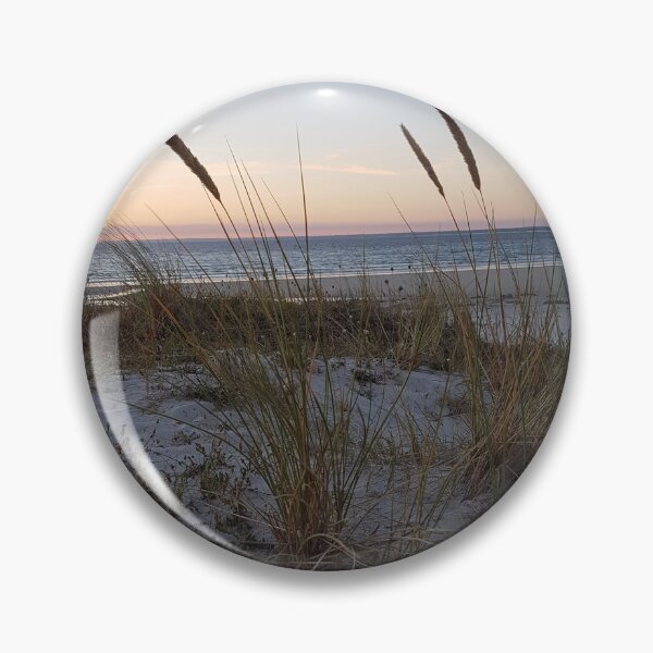 Item preview, Beach grasses in the evening atmosphere by the sea designed and sold by clickandmore.