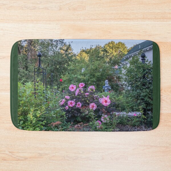 Item preview, Pink Blossoms on Hibiscus Shrub, Metal Obelisk Garden Trellis and "The Bicyclist" Sculpture  designed and sold by LINDA MCKUSICK.