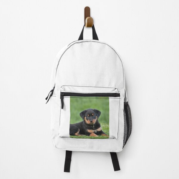Item preview, Cute Rottweiler Puppy Relaxing the Grass designed and sold by VanGaldo.