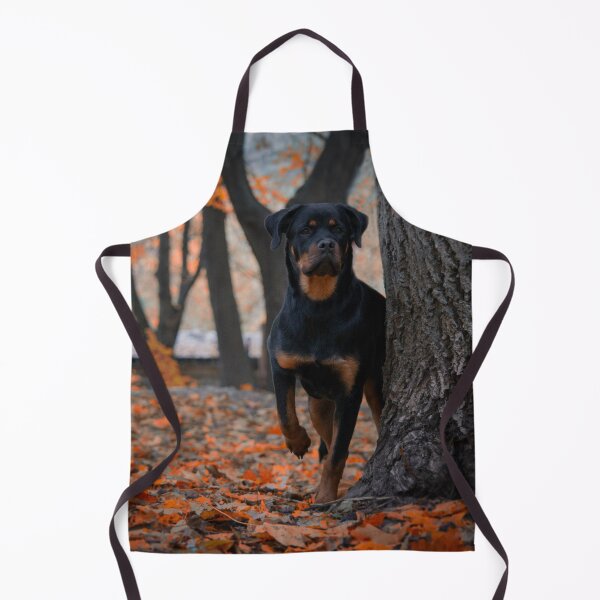 Item preview, Rottweiler Dog Hiding Beside Tree designed and sold by VanGaldo.