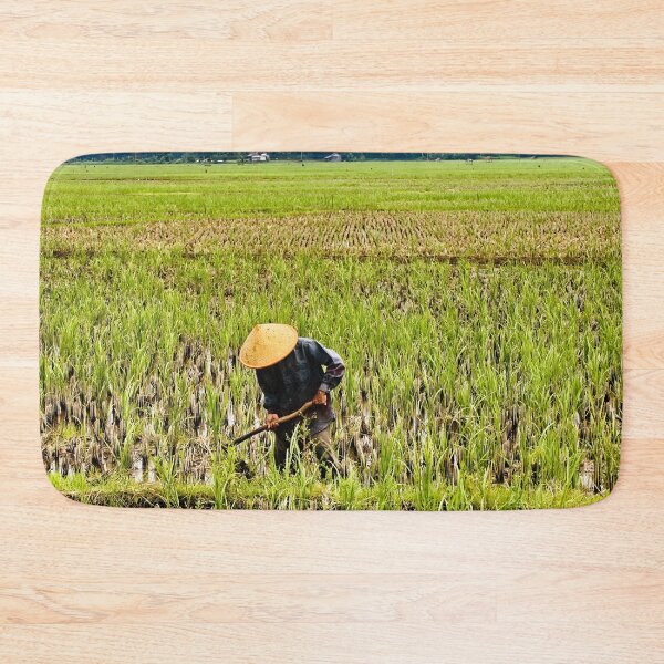 Item preview, An Indonesian farmer in the rice fields at the foot of the mountains designed and sold by franck380.