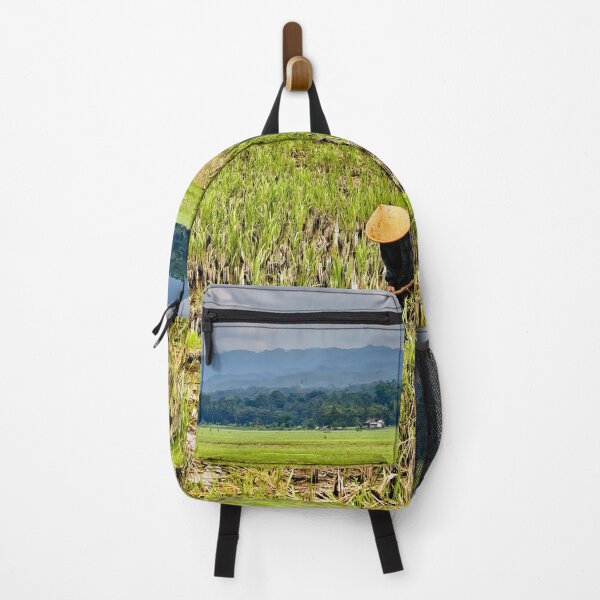Item preview, An Indonesian farmer in the rice fields at the foot of the mountains designed and sold by franck380.