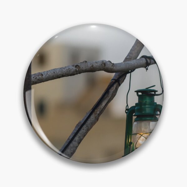 Item preview, Green Lantern Hanging From Rustic Wooden Frame With Blurred Urban Background designed and sold by Nmallia.