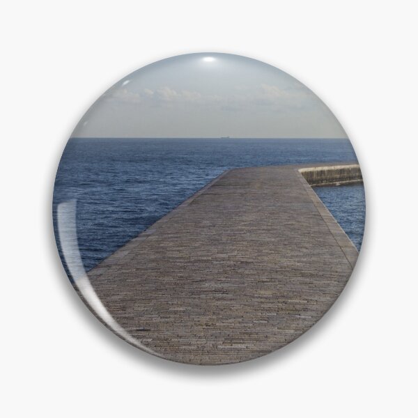 Item preview, Long Stone Pier Reaches Out Into Calm Sea Toward Lighthouse Under Clear Sky designed and sold by Nmallia.