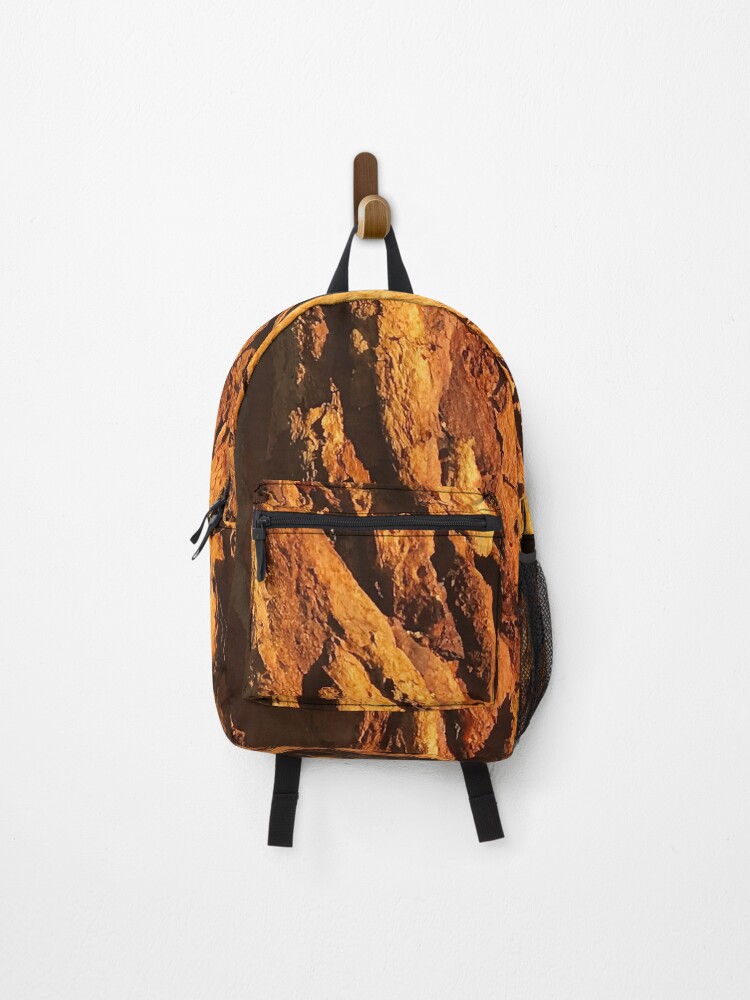 Thumbnail 1 of 3, Backpack, Textured Tree Bark Close-Up In Morning Sunlight designed and sold by DEC02.