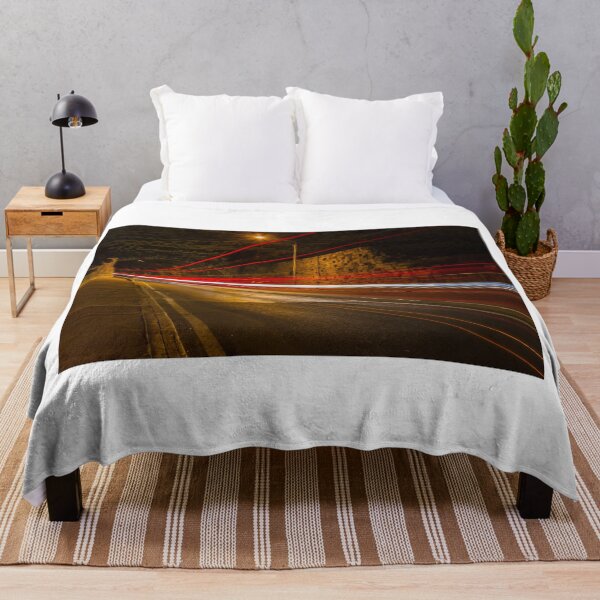 Item preview, Night Street With Light Trails Along Historic Stone Wall, Tunnel Arch, and Street Scene designed and sold by Nmallia.