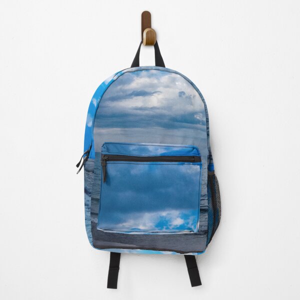 Item preview, Clouds fighting the blue sky over the water designed and sold by KillNFuel.