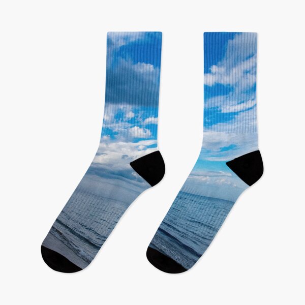 Item preview, Clouds fighting the blue sky over the water designed and sold by KillNFuel.