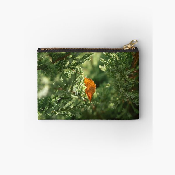 Item preview, A single autumn leaf on the green background. designed and sold by RinaZik.