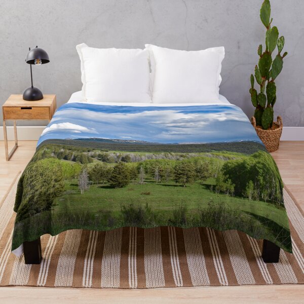 Item preview, Lush Green Valley Mountain Range Under Cloudy Sky designed and sold by KillNFuel.