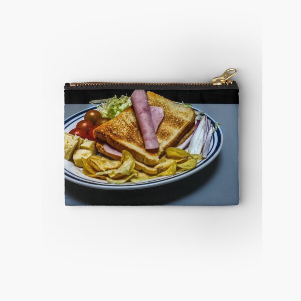 Item preview, Plate Of Toasted Ham Sandwich With Cheese, Chips And Fresh Vegetables For Lunch designed and sold by Nmallia.