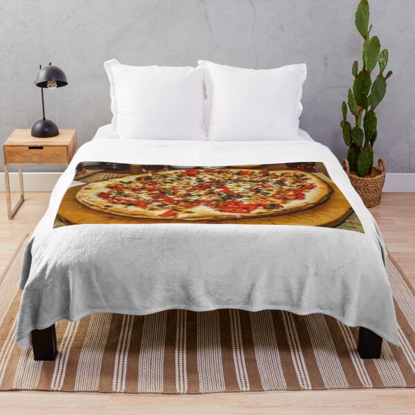 Item preview, Delicious Large Pizza With Tomato, Cheese, and Meat Toppings on Wooden Board designed and sold by Nmallia.
