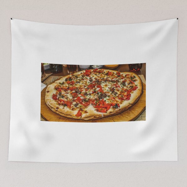 Item preview, Delicious Large Pizza With Tomato, Cheese, and Meat Toppings on Wooden Board designed and sold by Nmallia.
