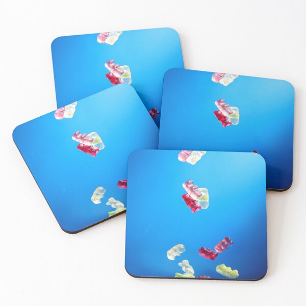 Item preview, Colorful Gummy Bears Falling Into White Bowl Against Bright Blue Background designed and sold by Nmallia.