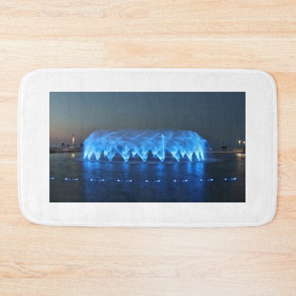 Item preview, Blue Night Fountain Show With Arching Water Jets in a Quiet Waterfront Park designed and sold by Nmallia.