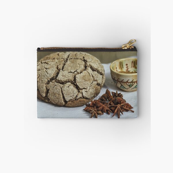 Item preview, Rustic Cracked Bread Loaf With Star Anise And Ceramic Cup On White Tablecloth designed and sold by Nmallia.
