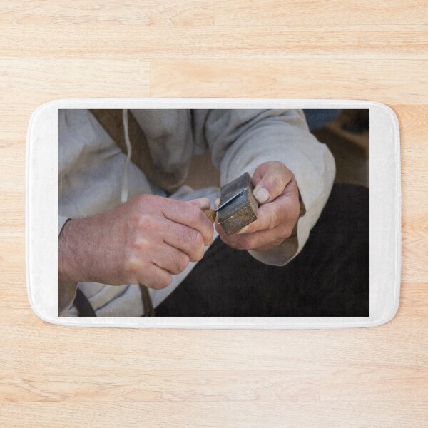 Item preview, Craftsman Sharpening Knife With Whetstone In Workshop: Close-Up Of Focused Hands designed and sold by Nmallia.