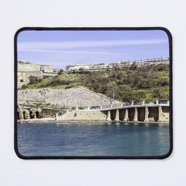 Item preview, Historic Coastal Fort and Bridge Over Calm Blue Water By Rocky Shoreline Fortress Scene designed and sold by Nmallia.