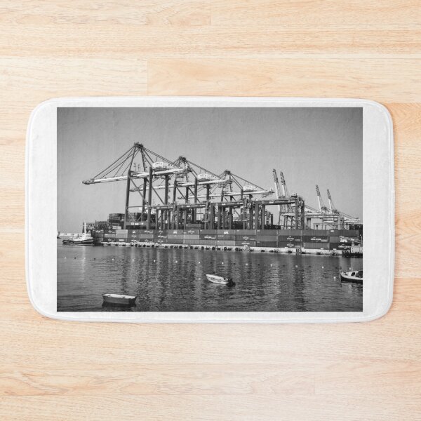 Item preview, Industrial Port Scene With Giant Container Cranes, Cargo Ships, And Calm Water designed and sold by Nmallia.