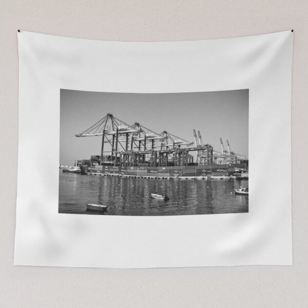 Item preview, Industrial Port Scene With Giant Container Cranes, Cargo Ships, And Calm Water designed and sold by Nmallia.