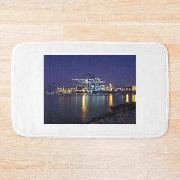 Item preview, Night At The Port: Large Cranes, Shipping Terminal, And Golden Reflections Across The Harbor designed and sold by Nmallia.