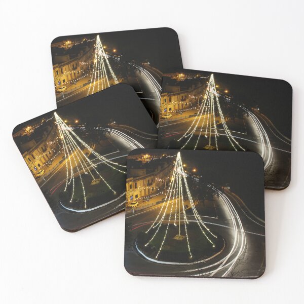 Item preview, Night Scene Of A Christmas Tree Lights Over A Roundabout On A City Street, Long Exposure Glow designed and sold by Nmallia.