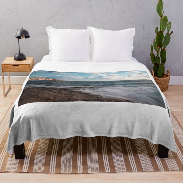 Item preview, Rugged Rocky Coastline With Ocean Waves and Metal Ladder by Cliff Under Cloudy Sky designed and sold by Nmallia.