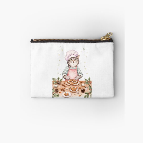 Item preview, Cat chef decorating gingerbread cookies at a cozy holiday kitchen designed and sold by SpaceartLilu.