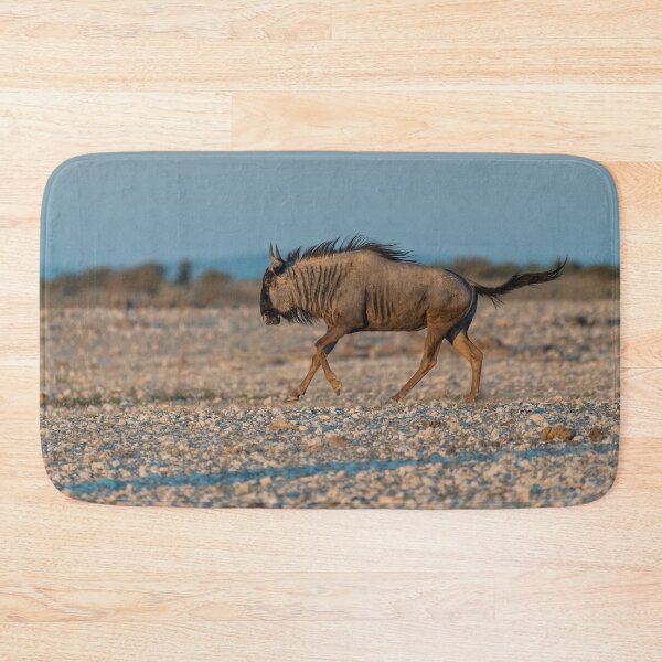 Item preview, Graceful Trot — Blue Wildebeest in Golden Light, Etosha, Namibia (2023) designed and sold by DavideAntoniani.