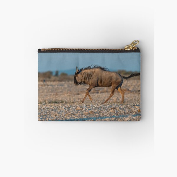 Item preview, Graceful Trot — Blue Wildebeest in Golden Light, Etosha, Namibia (2023) designed and sold by DavideAntoniani.