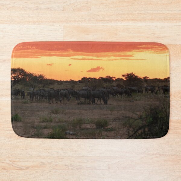 Item preview, Ember Horizon — Blue Wildebeest Herd at Sunset, Etosha, Namibia (2023) designed and sold by DavideAntoniani.
