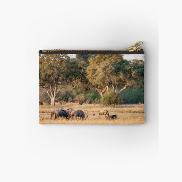 Item preview, Woodland Glow — Blue Wildebeest Grazing at Dusk, Southern African Savanna (2023) designed and sold by DavideAntoniani.
