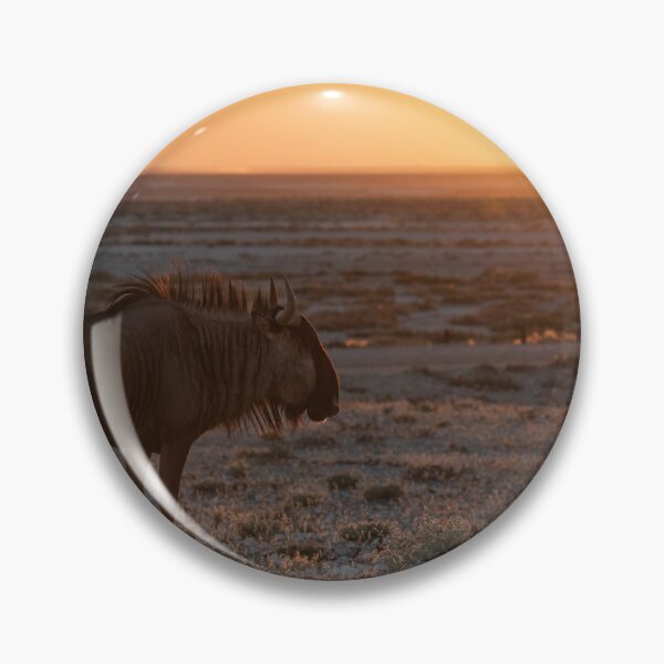 Item preview, Ember Sun — Blue Wildebeest at Sunset, Etosha National Park, Namibia (2023) designed and sold by DavideAntoniani.