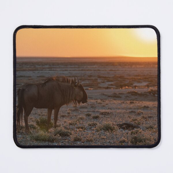 Item preview, Ember Sun — Blue Wildebeest at Sunset, Etosha National Park, Namibia (2023) designed and sold by DavideAntoniani.