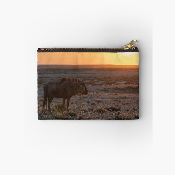 Item preview, Ember Sun — Blue Wildebeest at Sunset, Etosha National Park, Namibia (2023) designed and sold by DavideAntoniani.