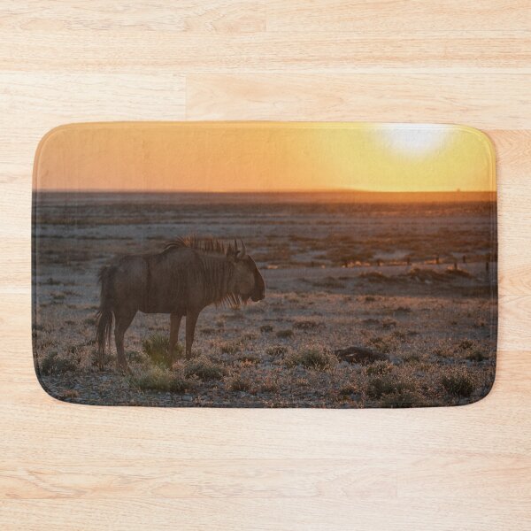 Item preview, Ember Sun — Blue Wildebeest at Sunset, Etosha National Park, Namibia (2023) designed and sold by DavideAntoniani.